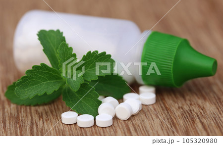 Stevia with sweetening tablets and bottle 105320980