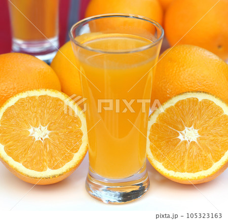 Oranges with glass of juice 105323163