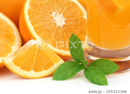 Oranges with glass of juice 105323166
