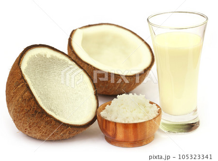 Fresh Coconut with milk in a glass Fresh Coconut with milk in a glass 105323341