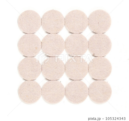 New felt adhesive furniture pads, isolated 105324343