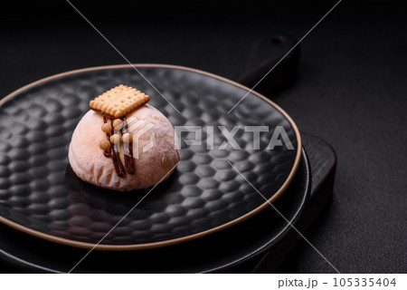 Delicious sweet colorful mochi desserts or ice cream with rice dough and toppings 105335404