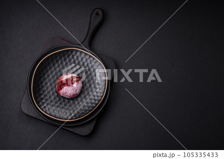 Delicious sweet colorful mochi desserts or ice cream with rice dough and toppings 105335433