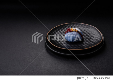 Delicious sweet colorful mochi desserts or ice cream with rice dough and toppings 105335498