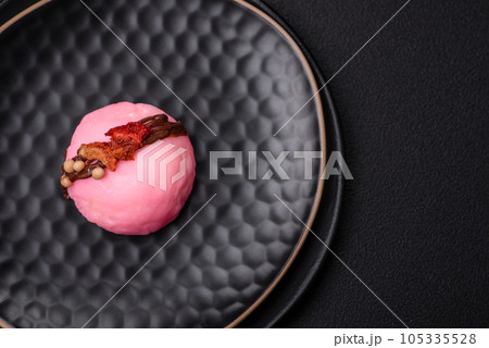 Delicious sweet colorful mochi desserts or ice cream with rice dough and toppings 105335528
