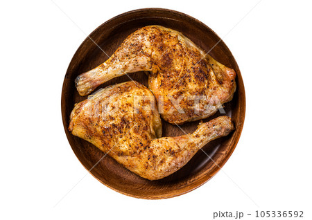 BBQ Grilled chicken legs in a wooden plate with herbs. High quality Isolate, white background. BBQ Grilled chicken legs in a wooden plate with herbs. High quality Isolate, white background. 105336592