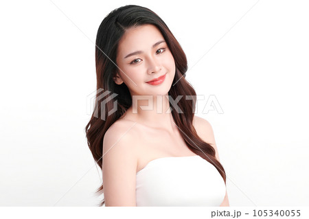 Beautiful young asian woman with clean fresh skin on white background, Face care, Facial treatment, Cosmetology, beauty and spa, Asian women portrait. Beautiful young asian woman with clean fresh skin on white background, Face care, Facial treatment, Cosmetology, beauty and spa, Asian women portrait. 105340055