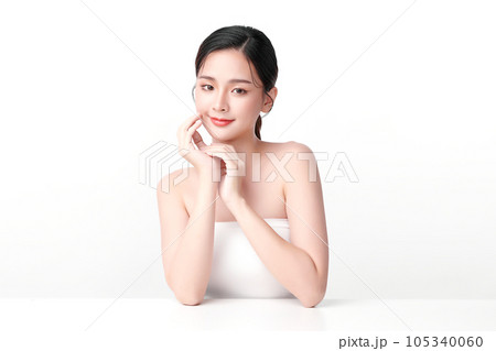 Beautiful young asian woman with clean fresh skin on white background, Face care, Facial treatment, Cosmetology, beauty and spa, Asian women portrait. Beautiful young asian woman with clean fresh skin on white background, Face care, Facial treatment, Cosmetology, beauty and spa, Asian women portrait. 105340060
