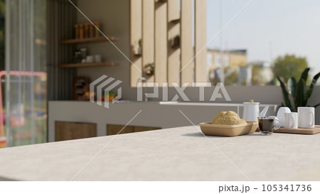 Close-up image of a copy space on a kitchen countertop with bread basket and coffee set 105341736
