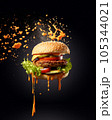 A burger, piled high with juicy beef, melted cheese, crisp lettuce, and tangy pickles. 105344021