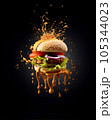 A burger, piled high with juicy beef, melted cheese, crisp lettuce, and tangy pickles. 105344023