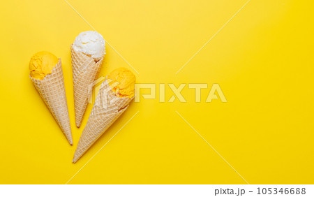 Assorted ice cream flavours in delightful waffle cones 105346688