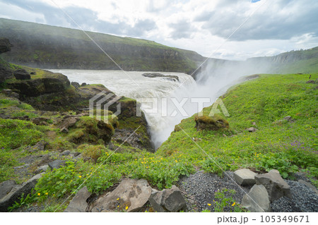 Gullfoss waterfall in summer season in Iceland. Famous nature landscape background Gullfoss waterfall in summer season in Iceland. Famous nature landscape background 105349671