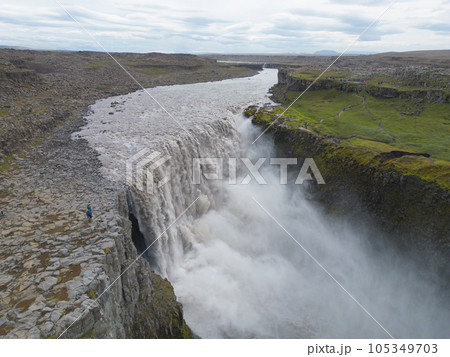 Dettifoss waterfall in summer season in Iceland. Famous nature landscape background 105349703