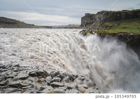 Dettifoss waterfall in summer season in Iceland. Famous nature landscape background 105349705