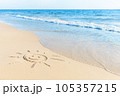 The drawing of the sun on sand beach with soft waves 105357215
