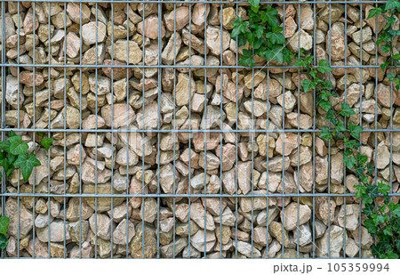 Gabion Stone Fence, Retaining Wall Gabion Baskets, Stones in Wire Mesh, Modern Garden Gravel Border Gabion Stone Fence, Retaining Wall Gabion Baskets, Stones in Wire Mesh, Modern Garden Gravel Border 105359994