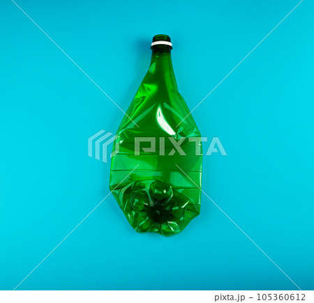 Green Empty Plastic Bottle, Crumpled Plastic Bottle, Global Pollution Concept Green Empty Plastic Bottle, Crumpled Plastic Bottle, Global Pollution Concept 105360612