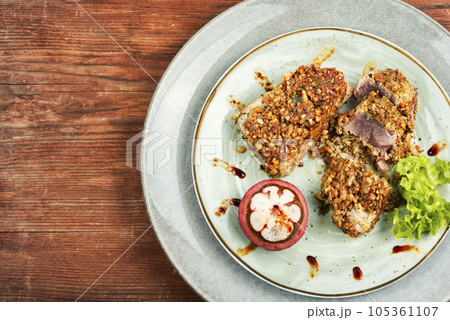 Tuna steak with mangosteens. 105361107
