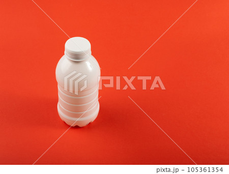 Empty Plastic Milk Bottle, White Plastic Bottle, Global Pollution Concept, Squashed Pet Bottles Empty Plastic Milk Bottle, White Plastic Bottle, Global Pollution Concept, Squashed Pet Bottles 105361354