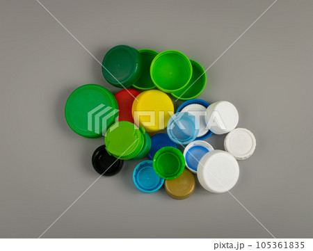 Plastic Bottle Caps Pile. Recycling HDPE Material Group, Circle Polyethylene Lid Set, Colorful Caps Group 105361835