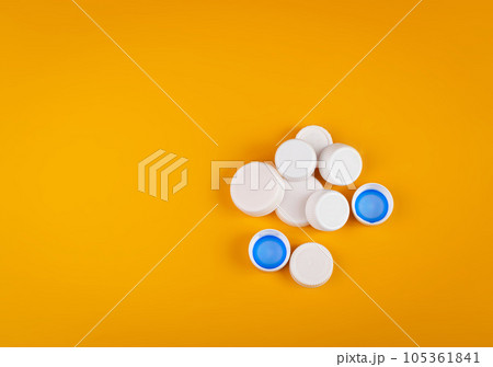 Plastic Bottle Caps Pile. Recycling HDPE Material Group, Circle Polyethylene Lid Set, Colorful Caps Group Plastic Bottle Caps Pile. Recycling HDPE Material Group, Circle Polyethylene Lid Set, Colorful Caps Group 105361841