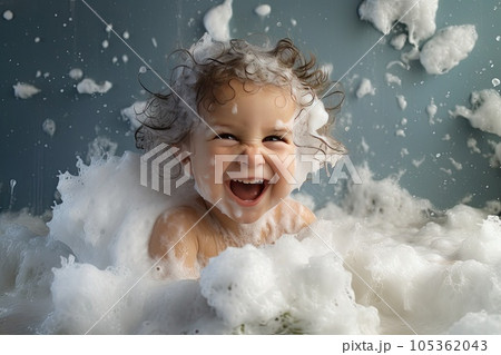 Little boy taking a bath in the tub take bath he plays with bubbles Little boy taking a bath in the tub take bath he plays with bubbles 105362043