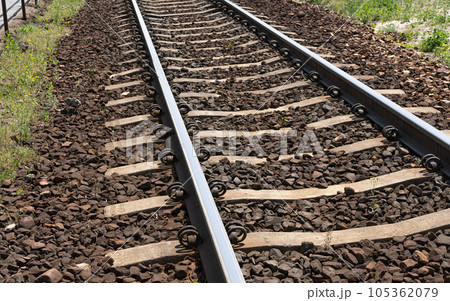 Railway Lines Closeup, Train Tracks with Track Ballast Stones, Metal Rails, Old Railway Track 105362079