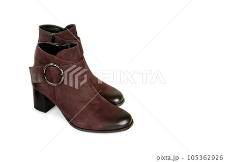 New female ankle boots isolated on white . Free space for text. New female ankle boots isolated on white . Free space for text. 105362926
