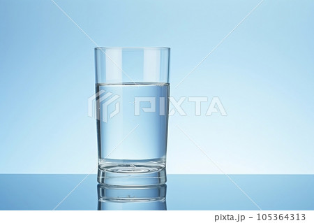 A clear glass glass is on the table A clear glass glass is on the table 105364313