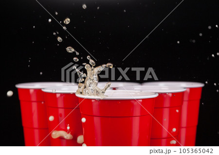 The arrangement of red plastic cups for game of beer pong 105365042