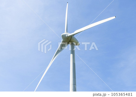 Close-up of wind power systems with blue sky background on the west coast of Taiwan. Close-up of wind power systems with blue sky background on the west coast of Taiwan. 105365481