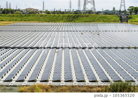 View of the floating Solar power system on the flood detention basin in Kaohsiung, Taiwan. View of the floating Solar power system on the flood detention basin in Kaohsiung, Taiwan. 105365520