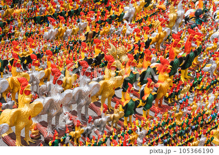 Chickens statue are worship and placed at the temple 105366190