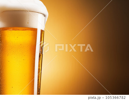 Glass of cold beer with foam, pint of original premium beer drink, alcohol flavour and holiday celebration 105366782