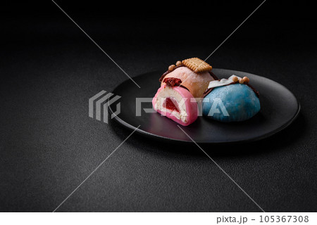 Delicious sweet colorful mochi desserts or ice cream with rice dough and toppings 105367308