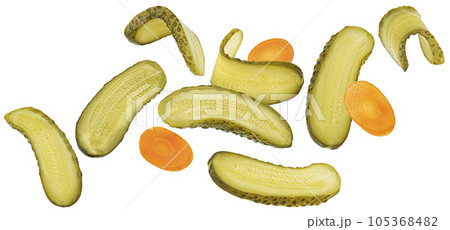 Pickled cucumber slices isolated on white background Pickled cucumber slices isolated on white background 105368482