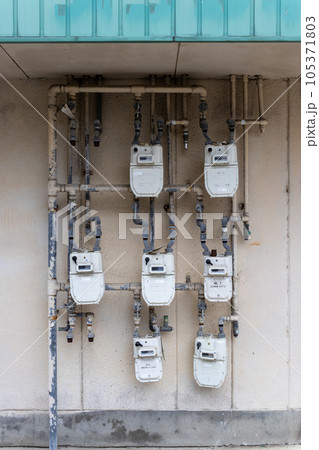 Gas meters outside apartment building, Kanazawa, Japan. Gas meters outside apartment building, Kanazawa, Japan. 105371803