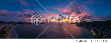The sky changes color from yellow to red as the sun sets over the sea..sunset landscape amazing light of nature cloudscape sky. .Big sun and red lighting sky background. 4k resolution The sky changes color from yellow to red as the sun sets over the sea..sunset landscape amazing light of nature cloudscape sky. .Big sun and red lighting sky background. 4k resolution 105372140