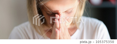 Tired woman in depression hopes for changes in life for the better. Tired woman in depression hopes for changes in life for the better. 105375350