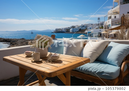 Outdoor seating on a terrace on a Greek island. Generative AI 105379802