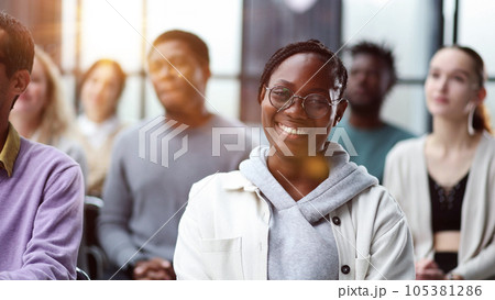 Businessmen attentively listen to the instructor at the lecture 105381286