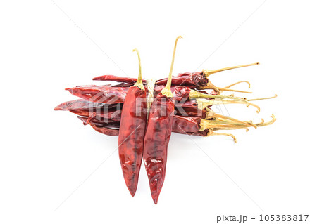 Dried chili peppers on white background 105383817