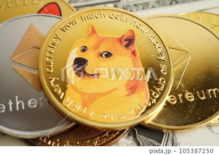 Golden bitcoin on US dollar banknotes money for business and commercial, Digital currency, Virtual cryptocurrency, blockchain technology. Golden bitcoin on US dollar banknotes money for business and commercial, Digital currency, Virtual cryptocurrency, blockchain technology. 105387250