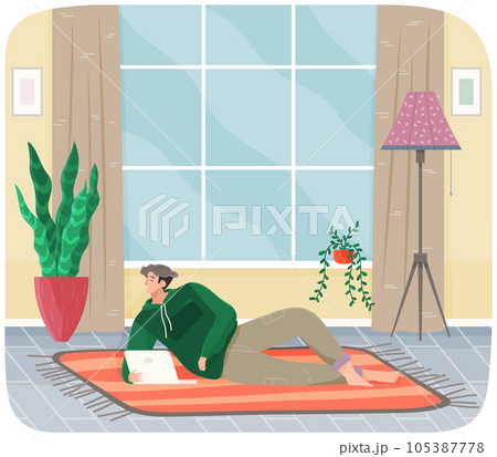 Man lying on couch with computer, holding laptop and correspondence surfing in Internet, typing 105387778