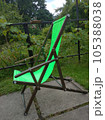 Relax and unwind in style with our exquisite wooden recliner chair featuring lush green fabric. 105388038