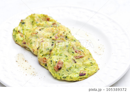 still life of zucchini cakes with bacon still life of zucchini cakes with bacon 105389372