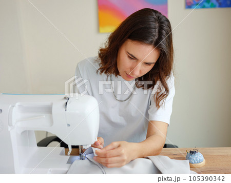 Workplace of a dressmaker. Handmade concept. Workplace of a dressmaker. Handmade concept. 105390342