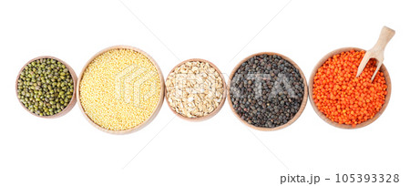 Different types of legumes and cereals on white background, top view. Organic grains Different types of legumes and cereals on white background, top view. Organic grains 105393328