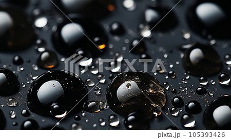 黒い板の上の水滴：背景画像